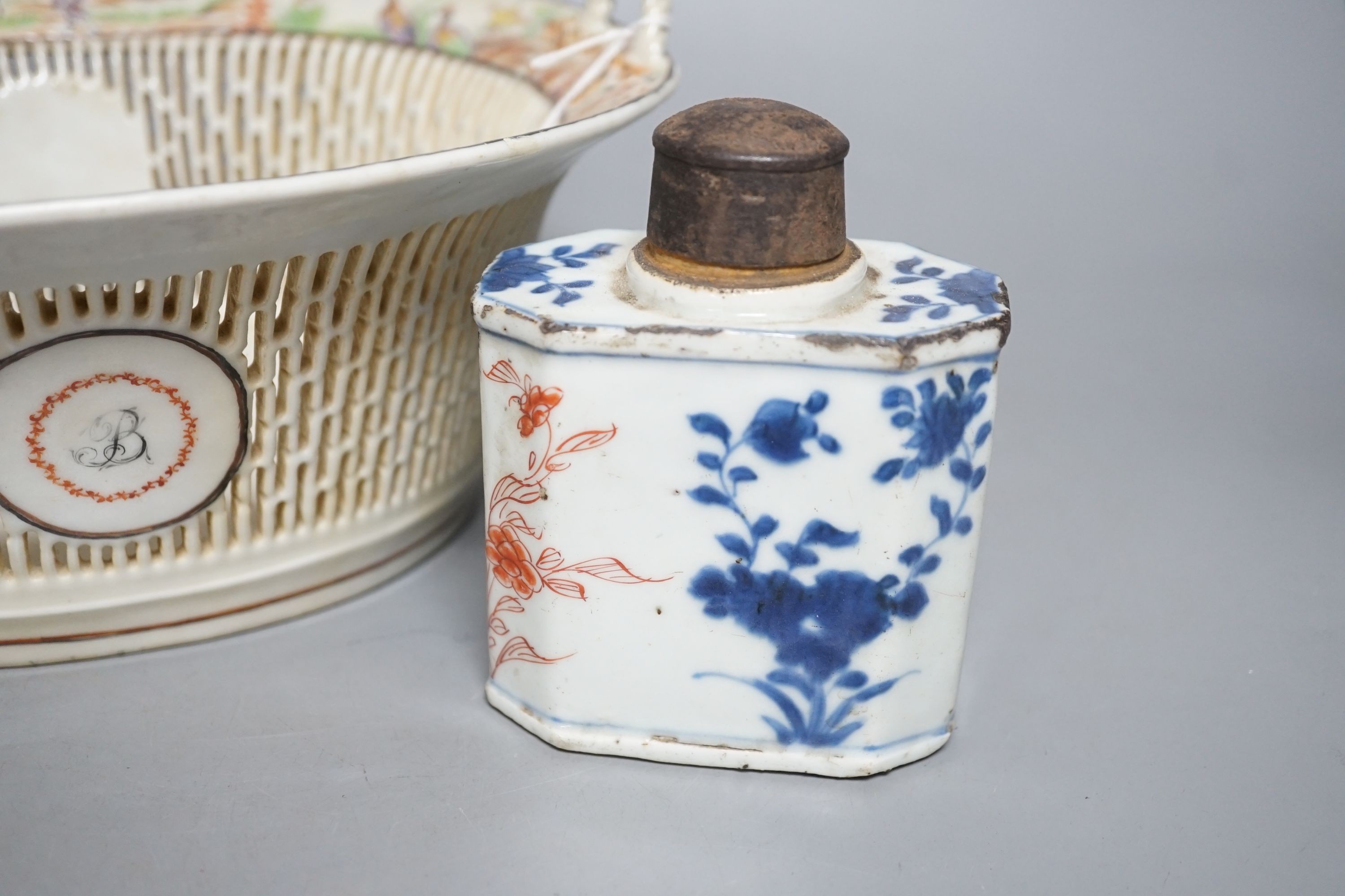 A late 18th century Chinese export famille rose chestnut basket, 27cm long, and a Chinese Imari tea caddy (2)